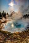 Geysers spew boiling water and steam into the air. Art Print